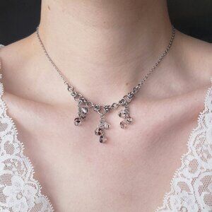 Gothic fairy dangly purple pearls necklace with a small silver chain